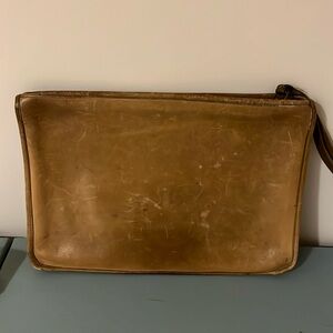 Coach pouch. Study, rugged, handsome!